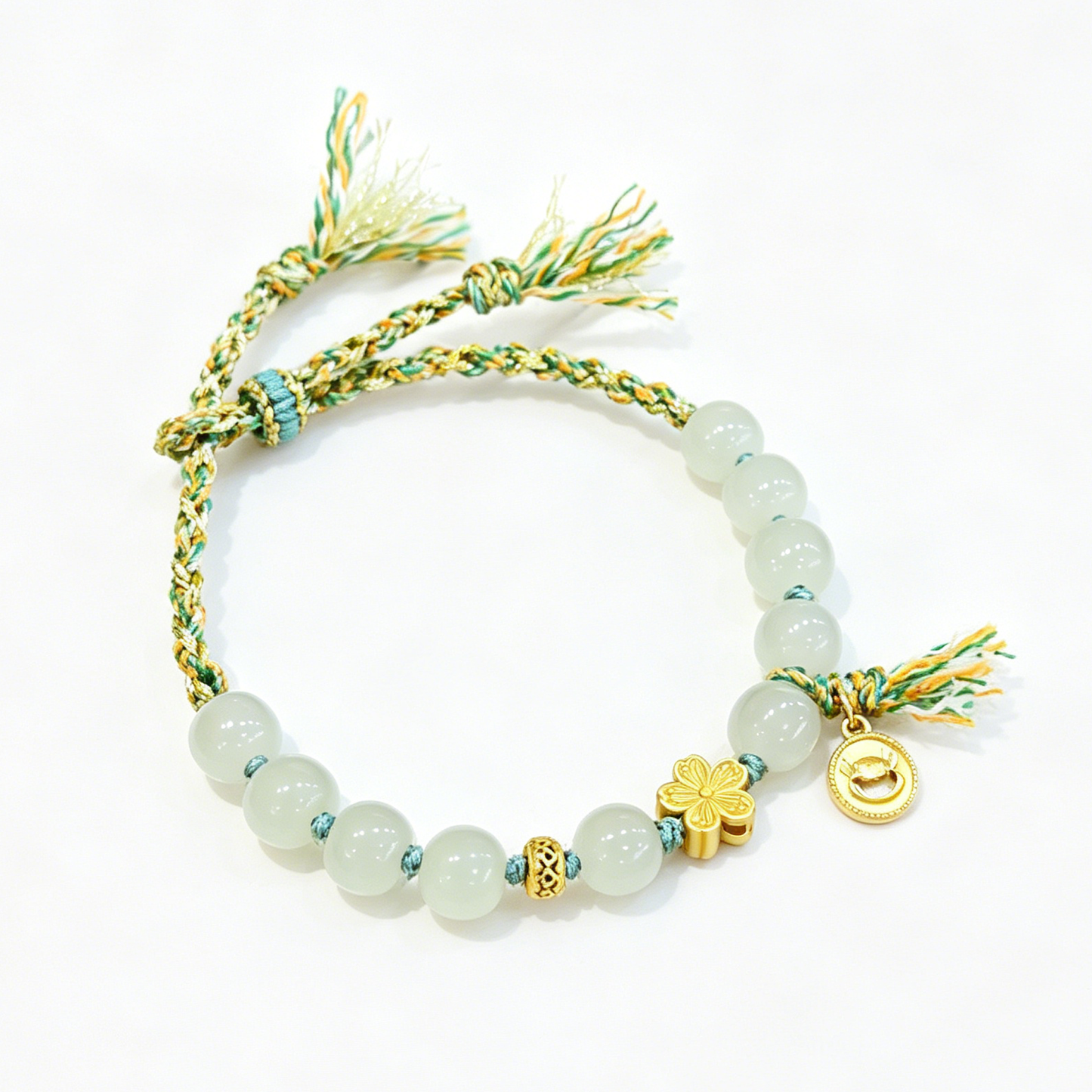 "Verdant Tassels & Guarded Peace" — Premium Hetian Jade Gilded Clover Woven Cord Bracelet